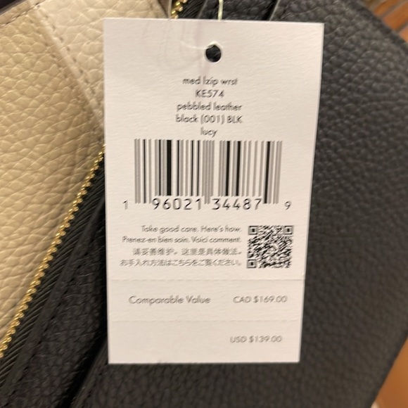 Kate Spade Medium Lucy L-Zip Wristlet Pebble Leather 
COLOR:
Black 
NWT - Picture 3 of 16